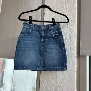 Never Worn! Guess mini denim skirt with guess logo on pocket